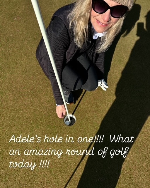 Adele Nielsen celebrating her hole-in-one at Wild Dunes Links Hole 4