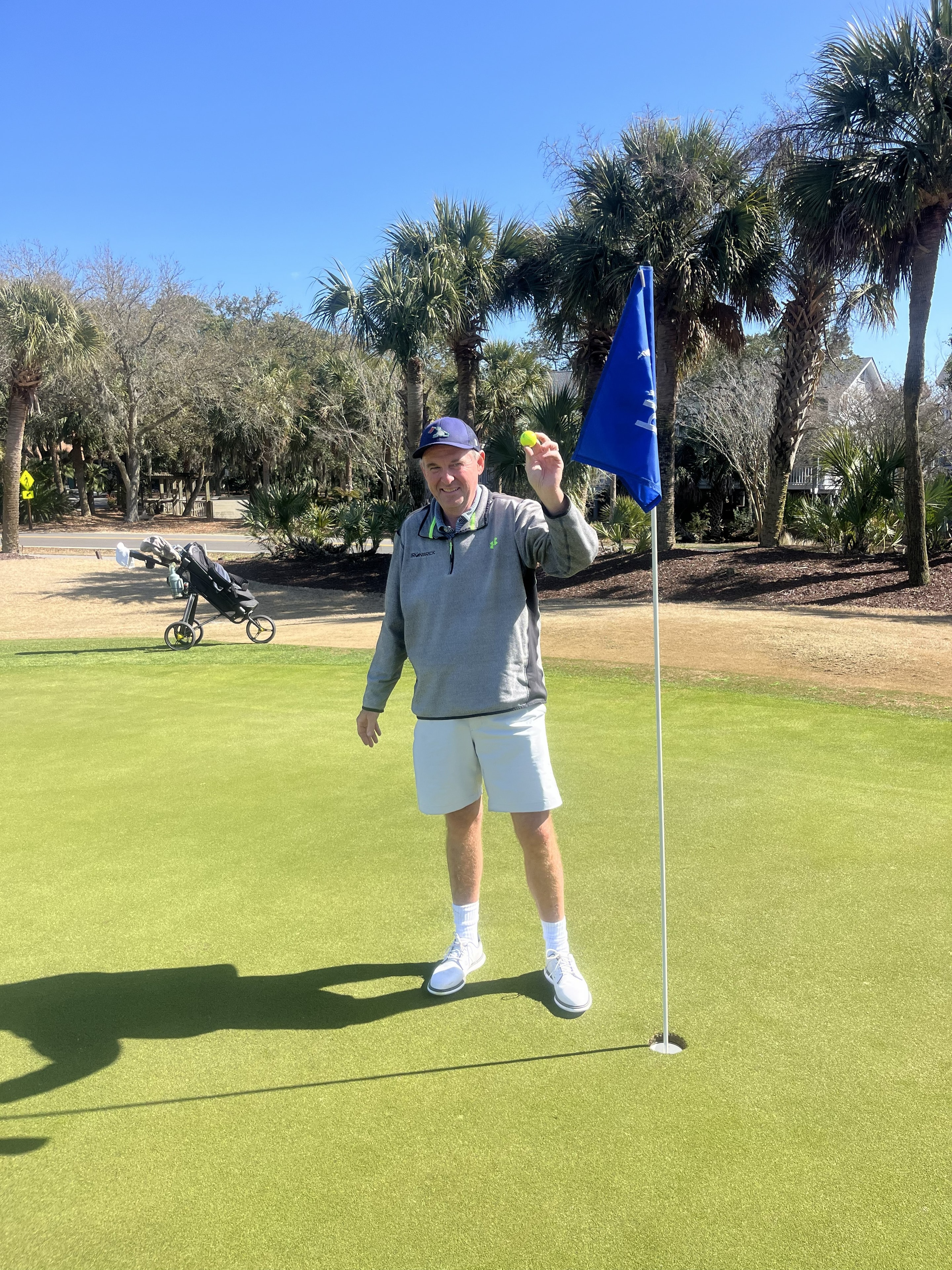 Greg O'Donnel celebrating his hole-in-one at Wild Dunes Links