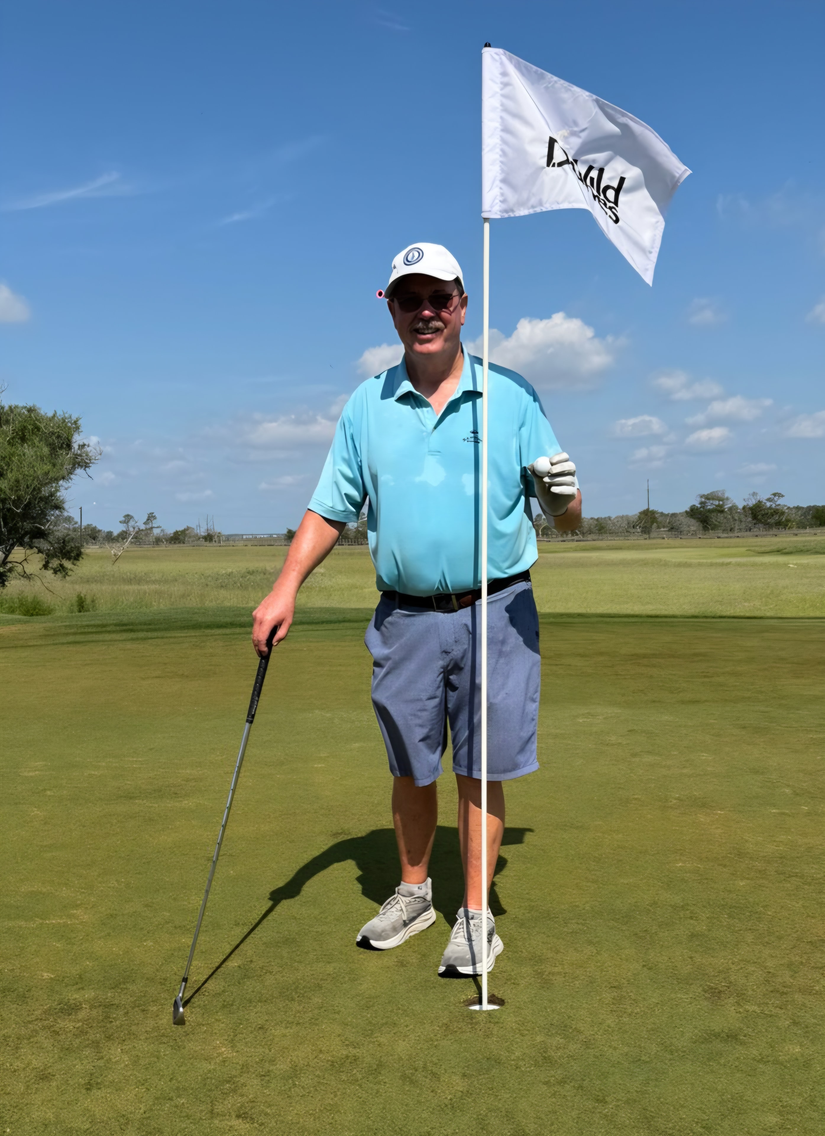 Mike Flint celebrating his hole-in-one at Wild Dunes Links Hole 16