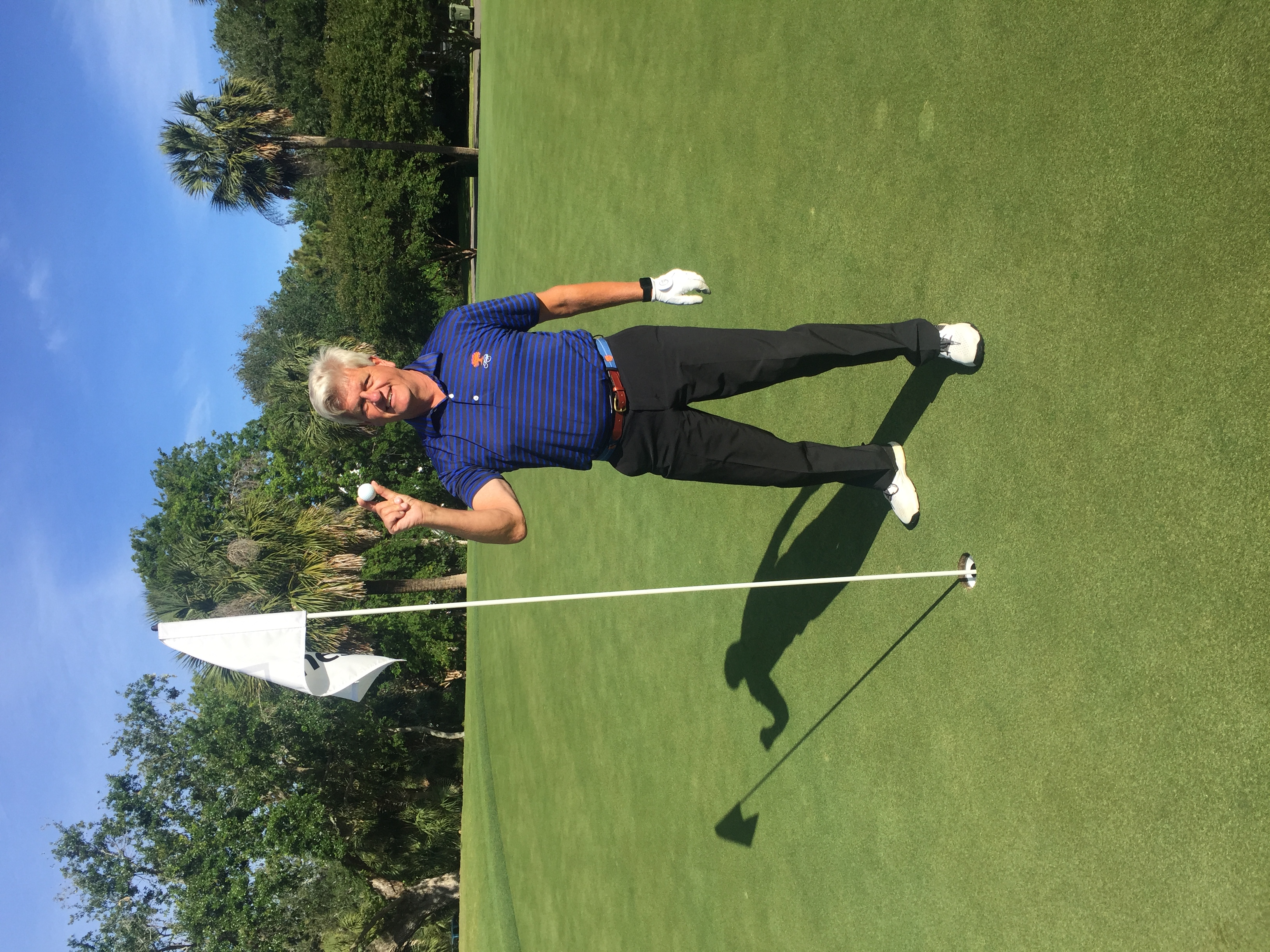 Wild Dunes member celebrating a hole-in-one on the green