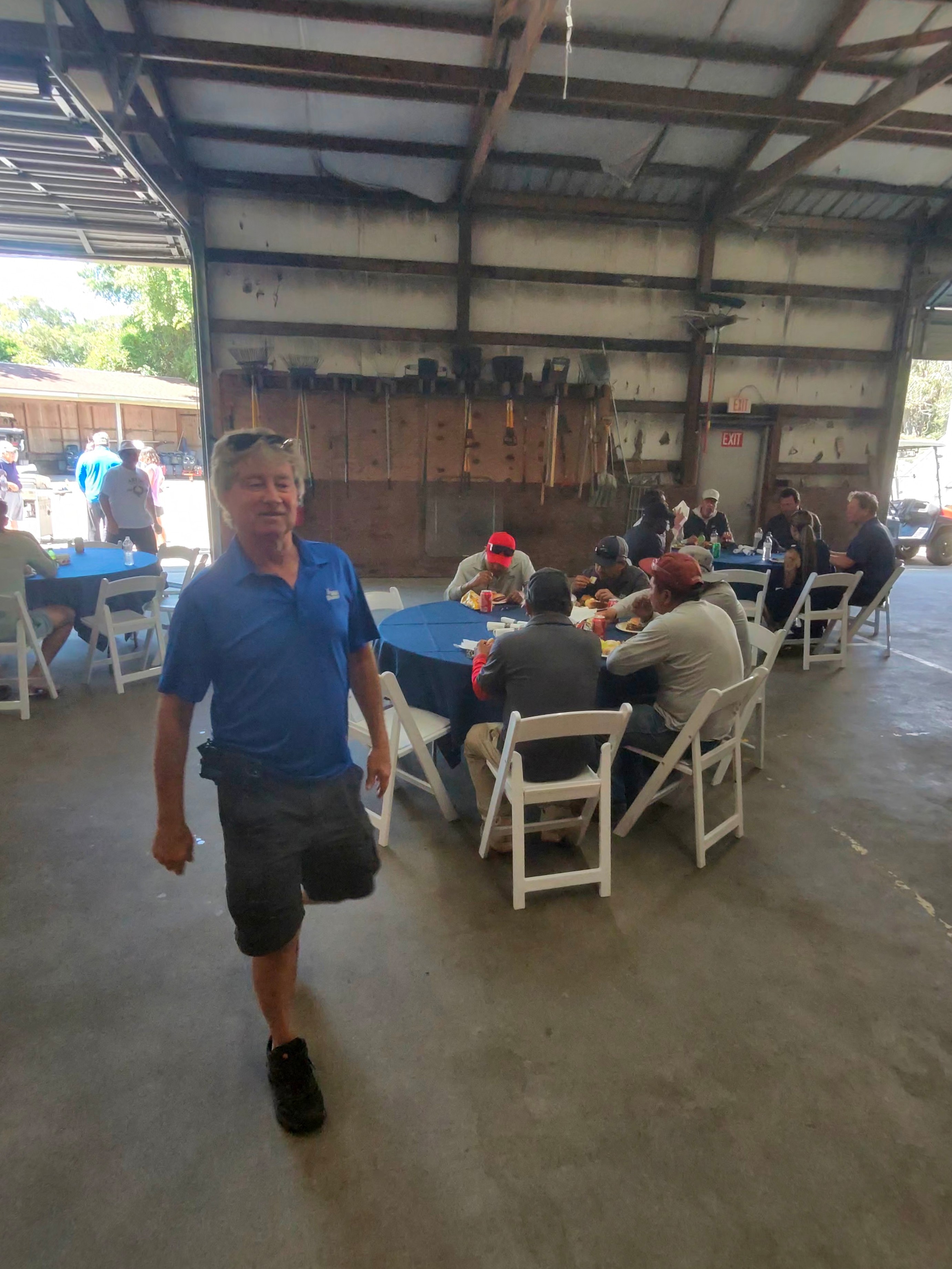 Wild Dunes member walking through the appreciation lunch in the maintenance barn