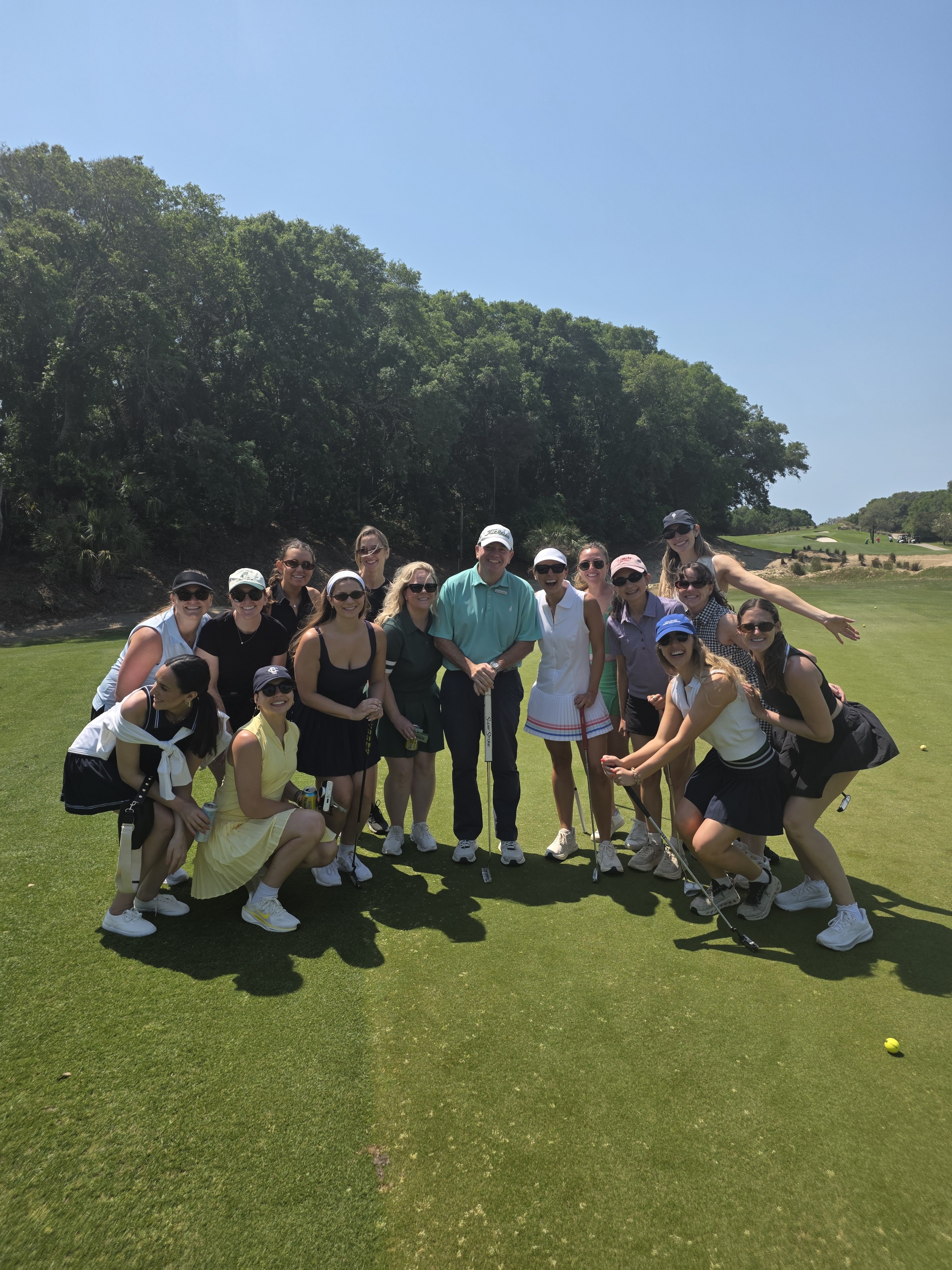 Coach Roy with the Wild Dunes ladies golf group on the course